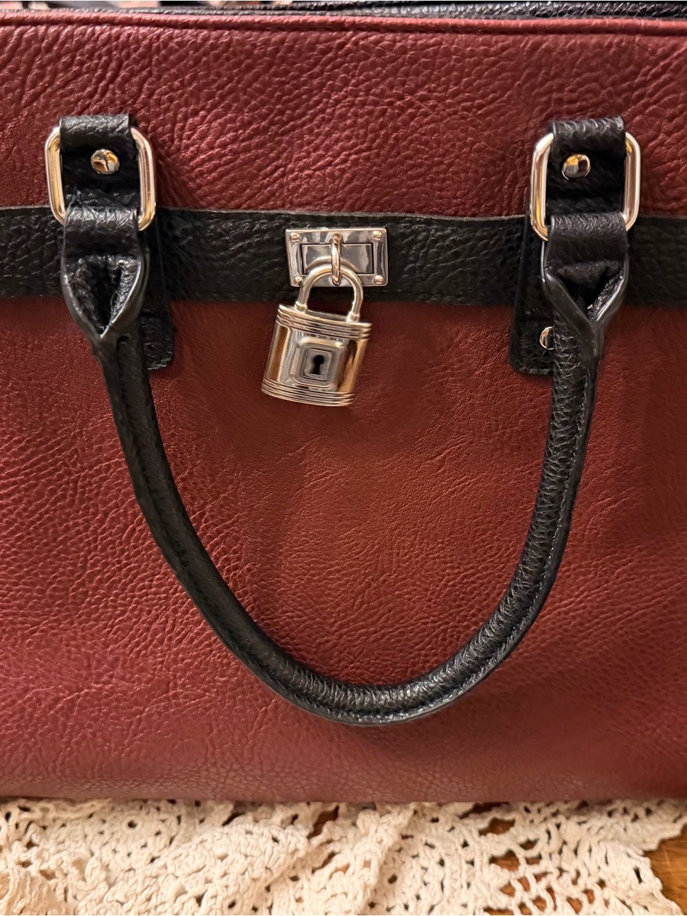 Structured Burgundy and Black Handbag with Padlock Detail